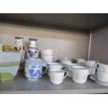 A Noritake Isabella part tea set having white ground, together with matching coffee cans, together