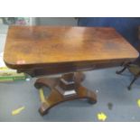 A Regency rosewood card table with a rotating foldover top, 29 1/2"h x 36"w