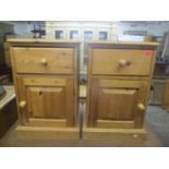 A pair of modern pine bedside cabinets 25"h x 16 1/2"w