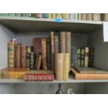 A quantity of 19th century leather and board bound books and others to include The Fall of