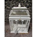 A white painted wooden bird cage