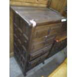 A reproduction hardwood chest of five drawers, together with a mid 20th century light wood four