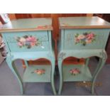 A pair of French painted bedside tables