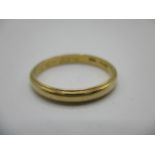 An 18ct yellow gold wedding band size W 1/2 by Cartier, total weight 3.55g