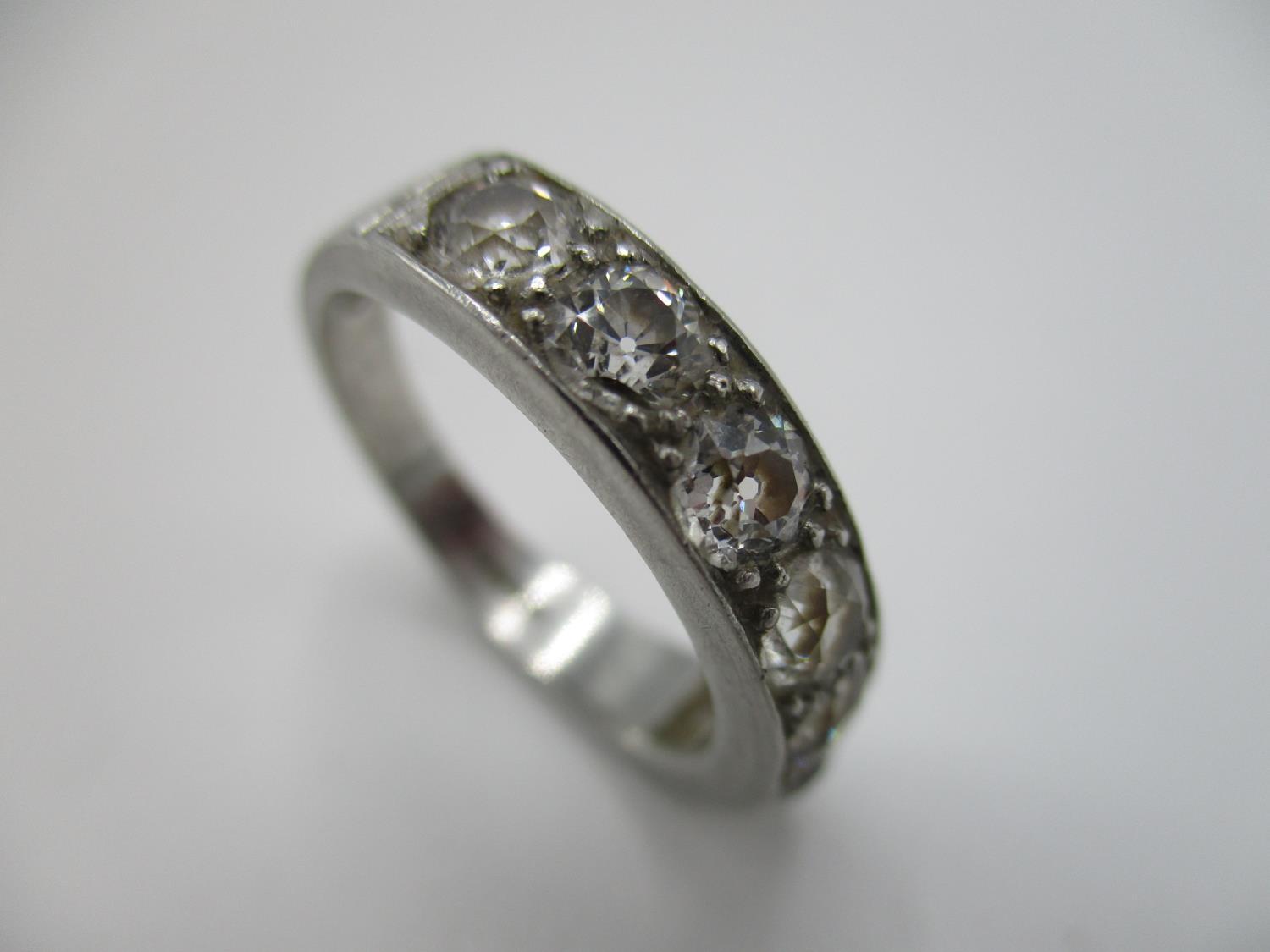 A platinum and diamond half eternity ring set with seven brilliant cut diamonds, approx 1.3 carat - Image 3 of 8