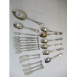 A selection of American sterling silver cutlery to include a set of seven cake forks having floral