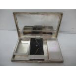A 1930s silver combination compact/purse and cigarette box by Goldsmiths & Silversmiths Ltd London