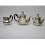 An early 20th century Dutch two piece teaset, the teapot dated 1926, the milk jug dated 1934,