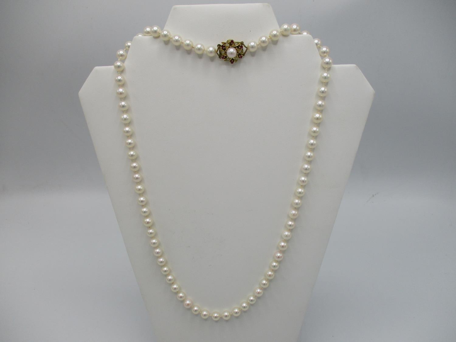 A cultured pearl necklace with an 18ct gold pearl/diamond and ruby set clasp, 24 1/2" long, - Image 2 of 6