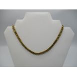A yellow gold neck chain with king braid/byzantine link, stamped 375 17 1/2" l, total weight 44.50g