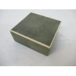 An early 20th century shagreen covered wooden cigarette box with a hinged lid, 1 3/4"h, 4 1/4"w, 4"d
