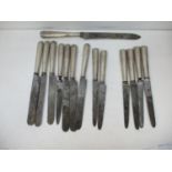 Fourteen 19th century silver handled knives, some by G A London 1864, comprising seven similar, a