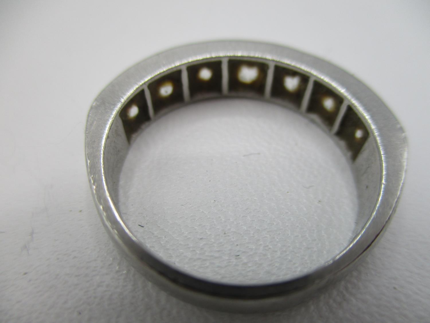 A platinum and diamond half eternity ring set with seven brilliant cut diamonds, approx 1.3 carat - Image 5 of 8