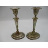 A pair of George V silver candlesticks, Sheffield 1912 by William Charles Fordham and Albert Buckley
