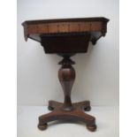A William IV sewing table with canted corner, the hinged lid enclosing a compartmented interior with