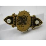 A Victorian bar brooch yellow metal inset with two pearls, 1 1/2"l, 8.35g