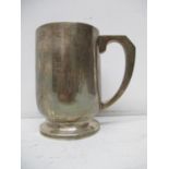 A George V silver tankard, Birmingham 1920, by Crisford & Norris of tapered cylindrical form and