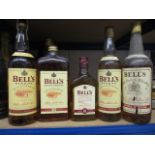 Five mixed bottles of Bells Scotch Whisky