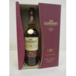 A bottle of Colenlivet 15 year French oak reserve whisky in a presentation box