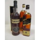 Three bottles of whisky to include Johnnie Walker black label, 70cl and 1lt and Tamoth single