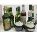 Seven bottles of mixed spirit to include Vermouth and Chartreuse