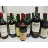 Twenty three mixed reds and white wines to include 1959 Chateauneuf-du-Pape, Bordeaux 1979