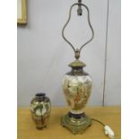 A Meiji period Japanese Satsuma table lamp with brass fittings and base, along with another