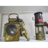 An early 20th century miners lamp no 548, together with an early 20th century dependence lamp holder