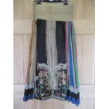 A 19th century Chinese silk embroidered wrap around apron skirt having a cotton/hemp waistband,