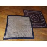 Aquascutum - a late 20th century silk scarf having a navy border enclosing a navy and tan