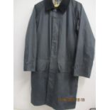 A gents Barbour black lightweight three quarter length rain mac, approximately 40" chest x 39"