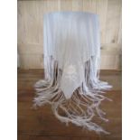 A late 1920s cream silk and embroidered piano shawl with tassels