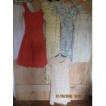 Six items of ladies clothing 1930s-1950s to include an orange cocktail dress with netted