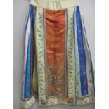 A late 19th Century Chinese silk embroidered wrap-around apron skirt having a cotton/hemp waist