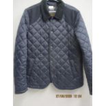 Barbour Landrover Defender- A lightweight padded jacket in navy, size L, approximately 38" x 28",