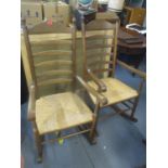 Two oak framed rush seated rocking chairs