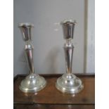 A pair of modern filled silver candlesticks, B & Co.