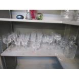 A selection of various Waterford cut table glass to include a decanter and stopper, and brandy