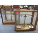 Two mahogany cased chemist balance scales