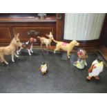 A small collection of Beswick figures to include foxhound and a goldfinch (7)