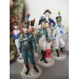 A collection of six Naples soldier figurines