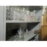 A quantity of cut and pressed table glass to include Victorian and later decanters, signed cut glass