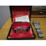 A boxed Sekonda Russian mechanical wind gents wristwatch with date at three and a Sekonda 5