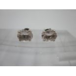 A pair of morganite stud earrings in silver settings