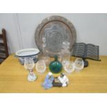 A mixed lot of glassware, porcelain figures, metal kitchen bookstand and other items