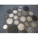 A group of mainly silver coins to include an 1835 half crown, a 1887 half crown and Charles II