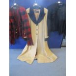 A late 20th century Louis Feraud ladies camel wool, full length coat in tan with black cuff panels
