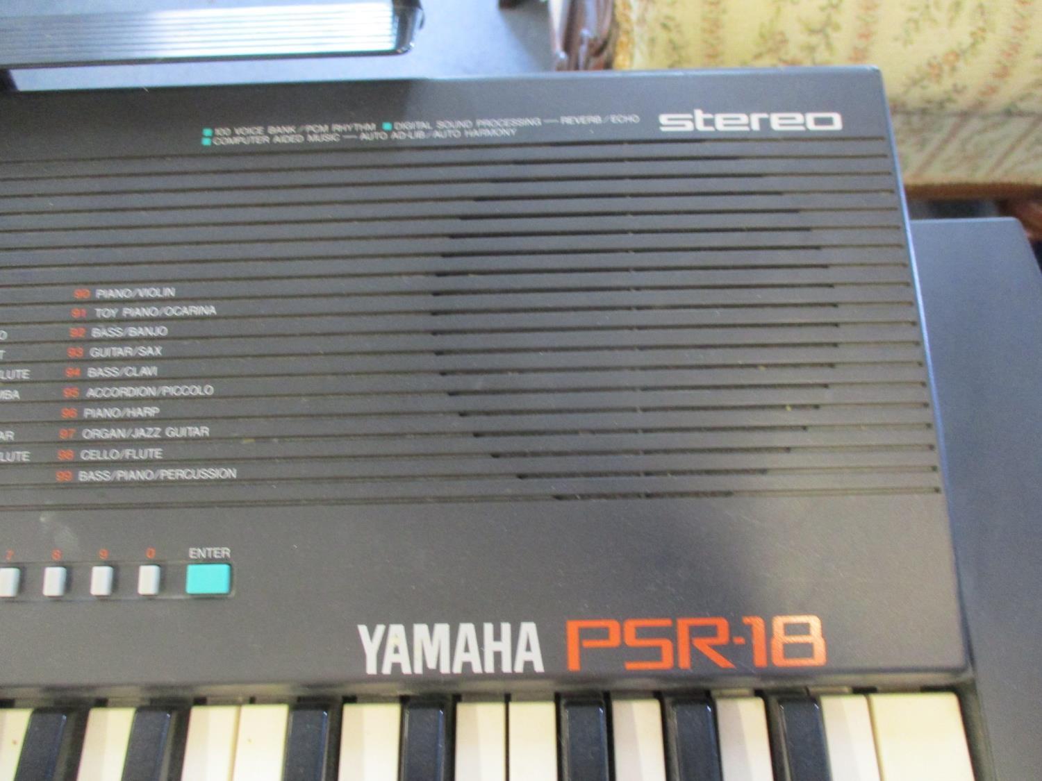 A late 20th century Yamaha keyboard and stand and two other keyboards - Image 2 of 3