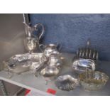A selection of silver plate to include a toast rack, wine decanter and other mixed silver plate,