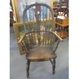 An 18th century Windsor elm seated armchair A/F